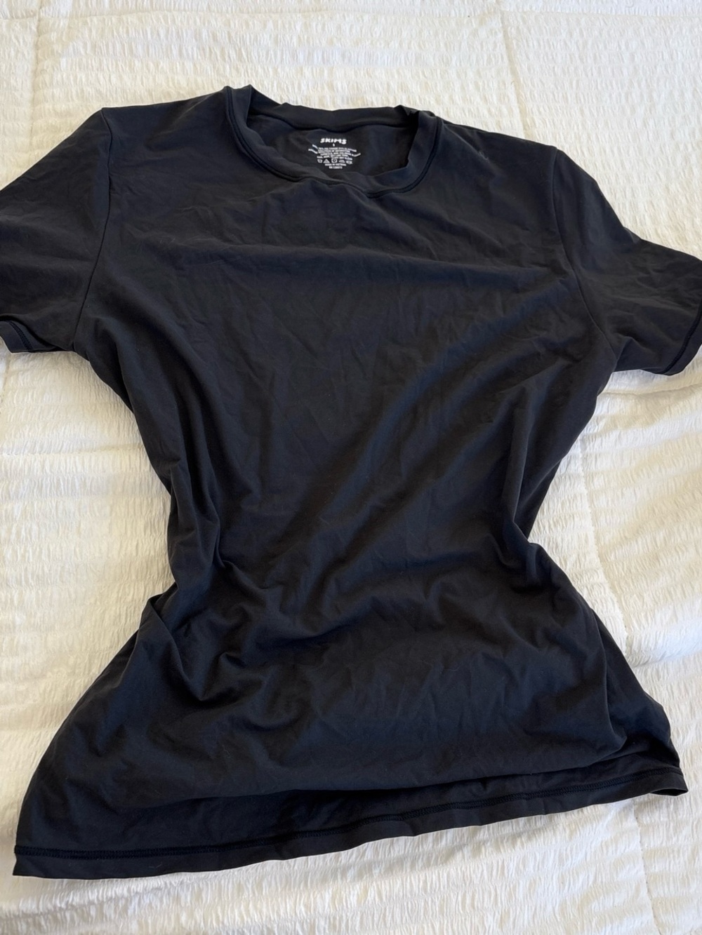 Skims Black shirt
